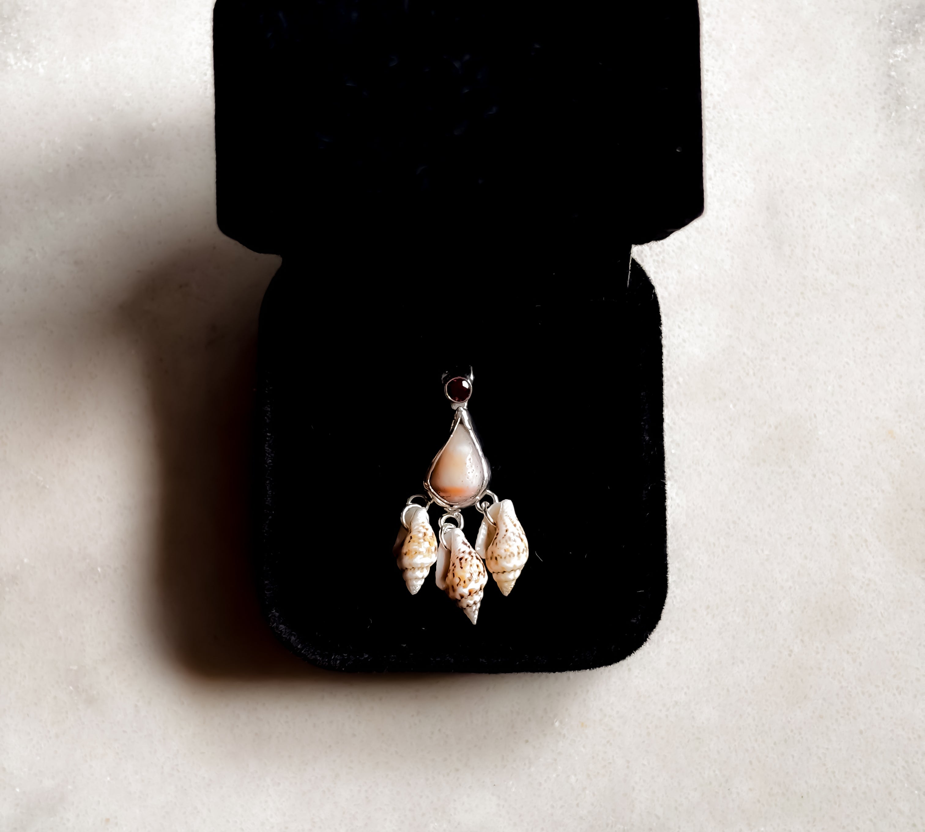 Remnant 004 - Silver Shell Fragment Red Garnet Pendant