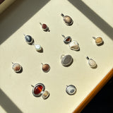 Remnant 006 - Grey Cream Pebble Silver Pendant