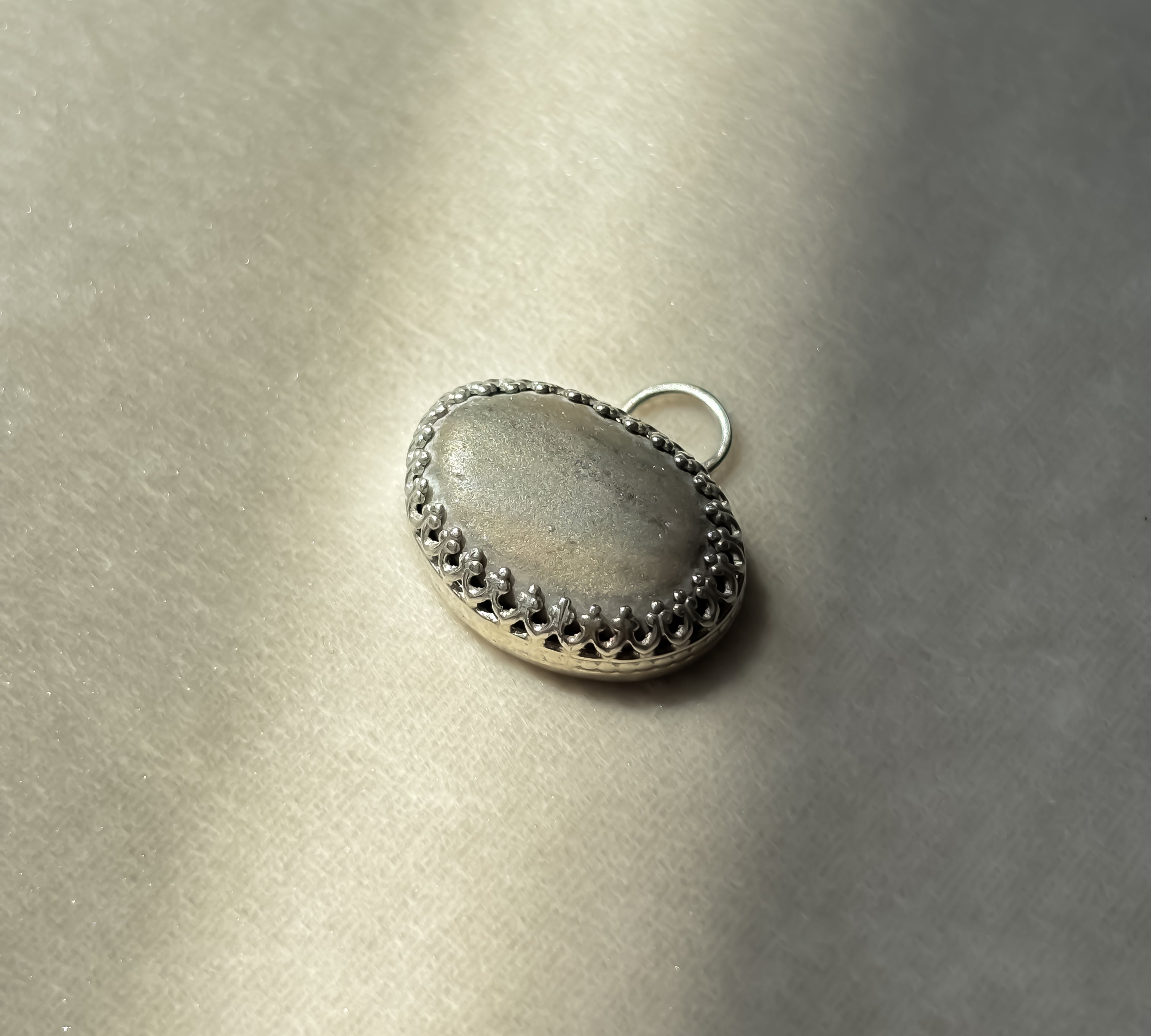 Remnant 006 - Grey Cream Pebble Silver Pendant