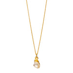 A raw Citrine pendant electroplated in 22ct Gold, attached to a gold-filled cable chain necklace.