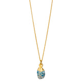 A raw Turquoise crystal pendant electroplated in gold, hanging from a gold-filled cable chain necklace.