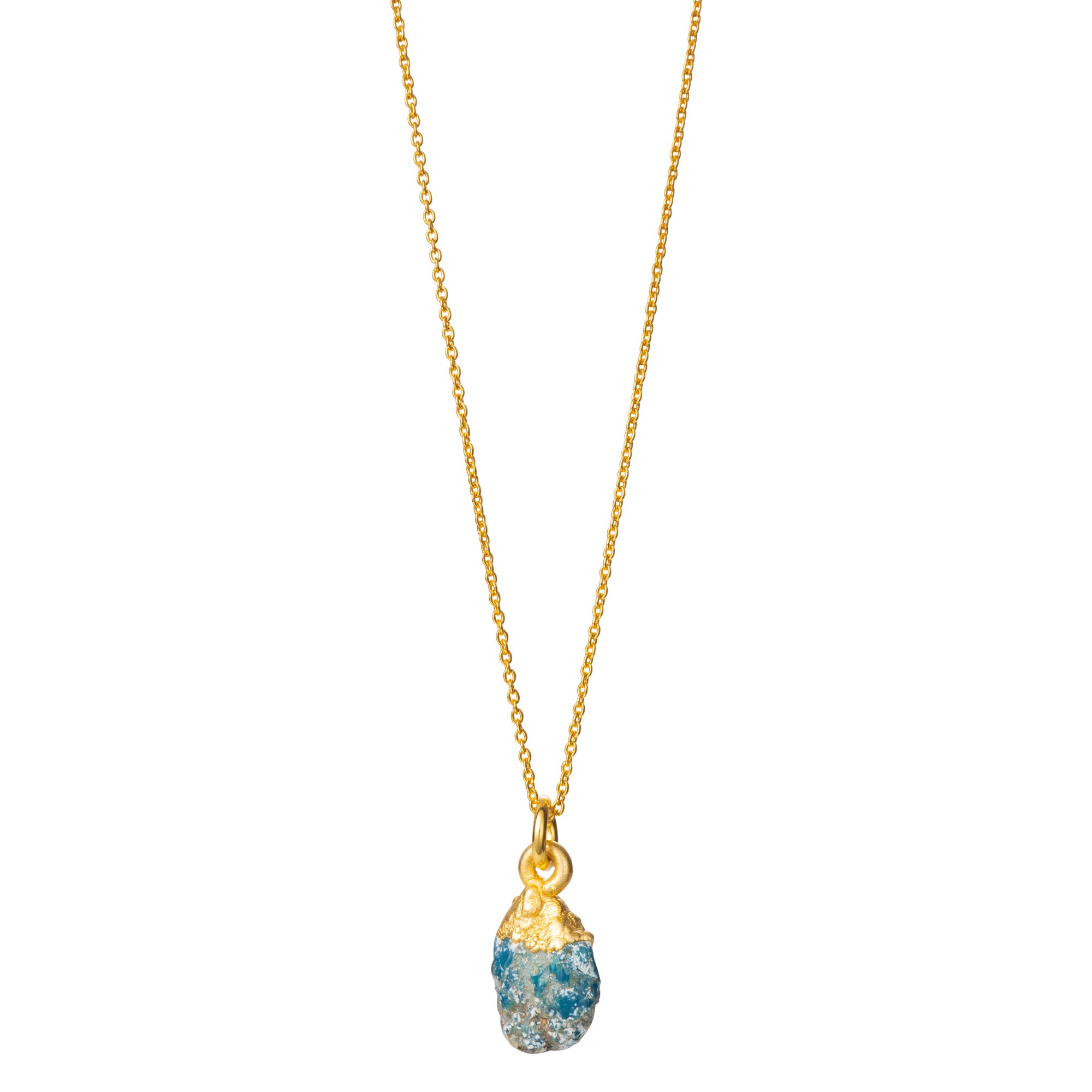 A raw Turquoise crystal pendant electroplated in gold, hanging from a gold-filled cable chain necklace.